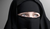 Switzerland bans ‘face coverings’ in pub...